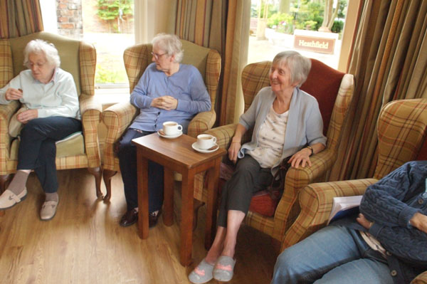 Heathfield ladies enjoying coffee in the sun lounge