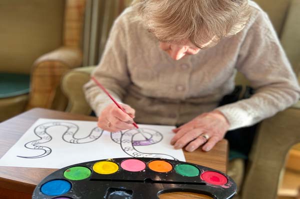 A Heathfield resident enjoys a painting session