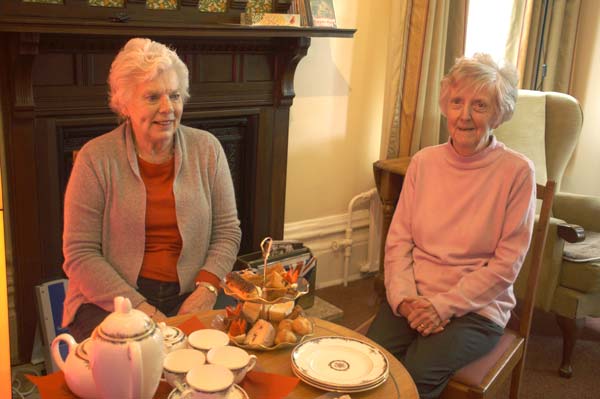 Two of Heathfield's residents enjoy afternoon tea